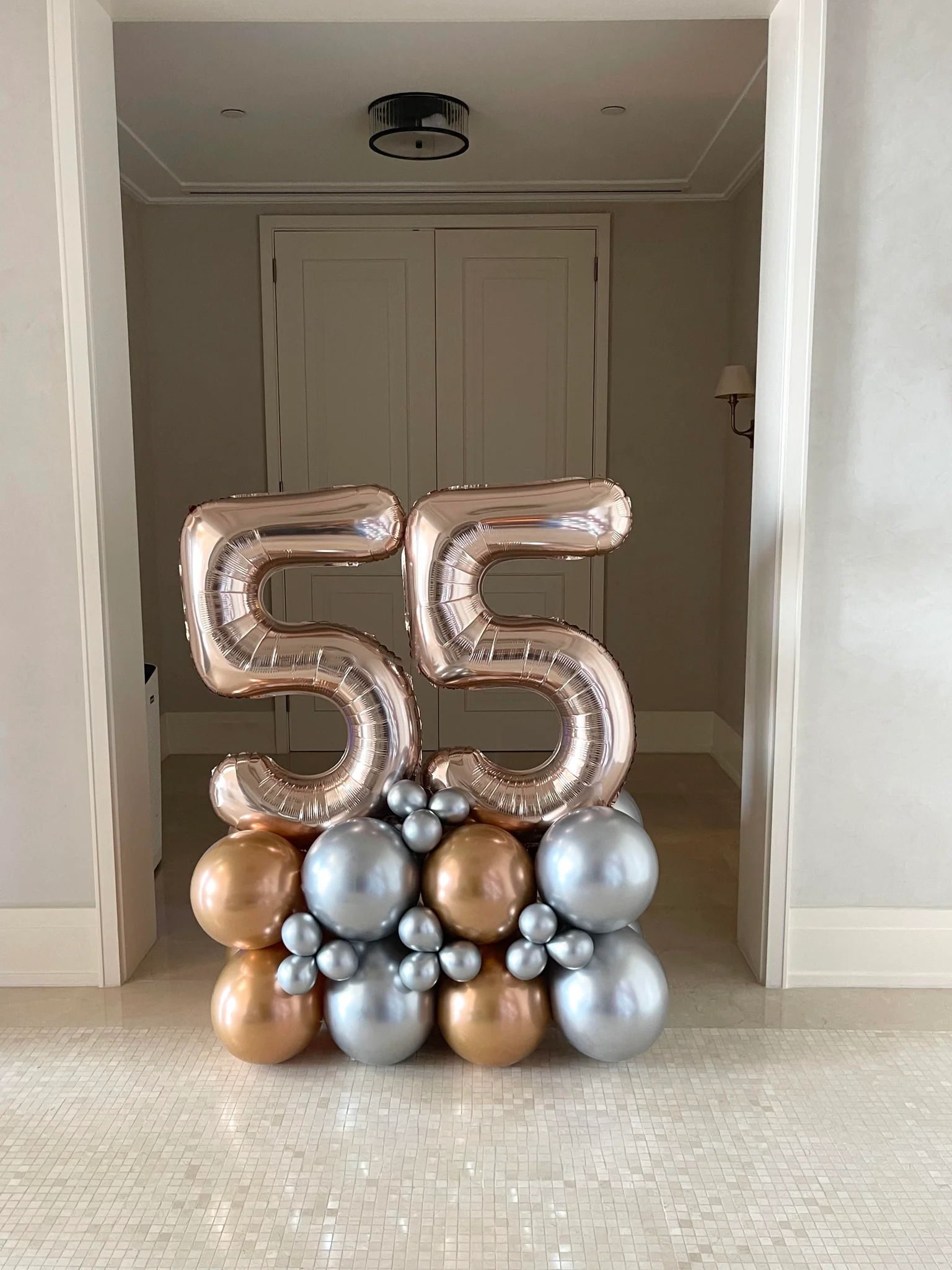 55th birthday balloons pillar in Dubai