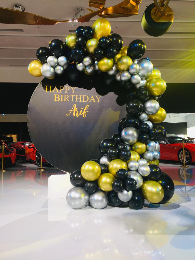 balloon arch with customized printed backdrop