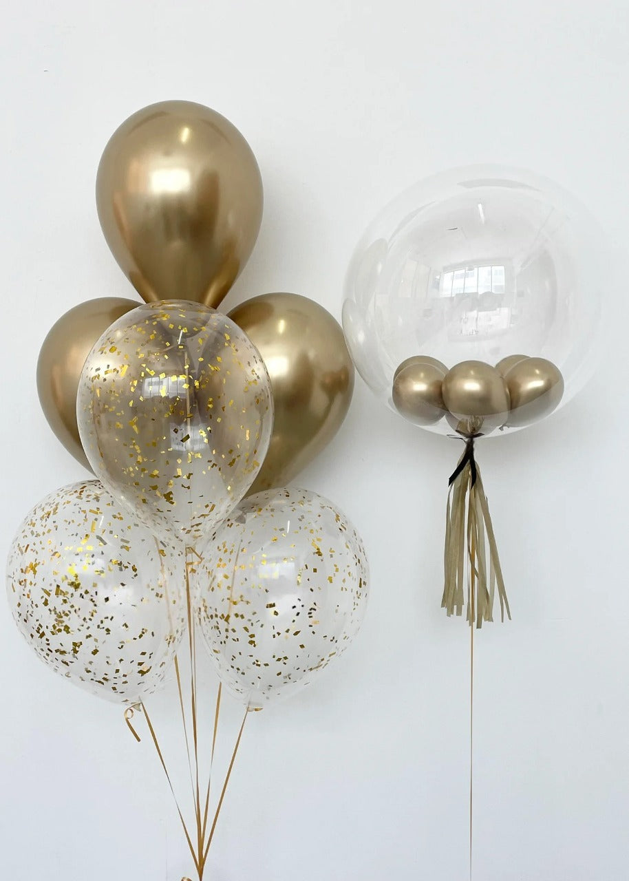 gold and clear balloons with confetti filling for delivery in Dubai