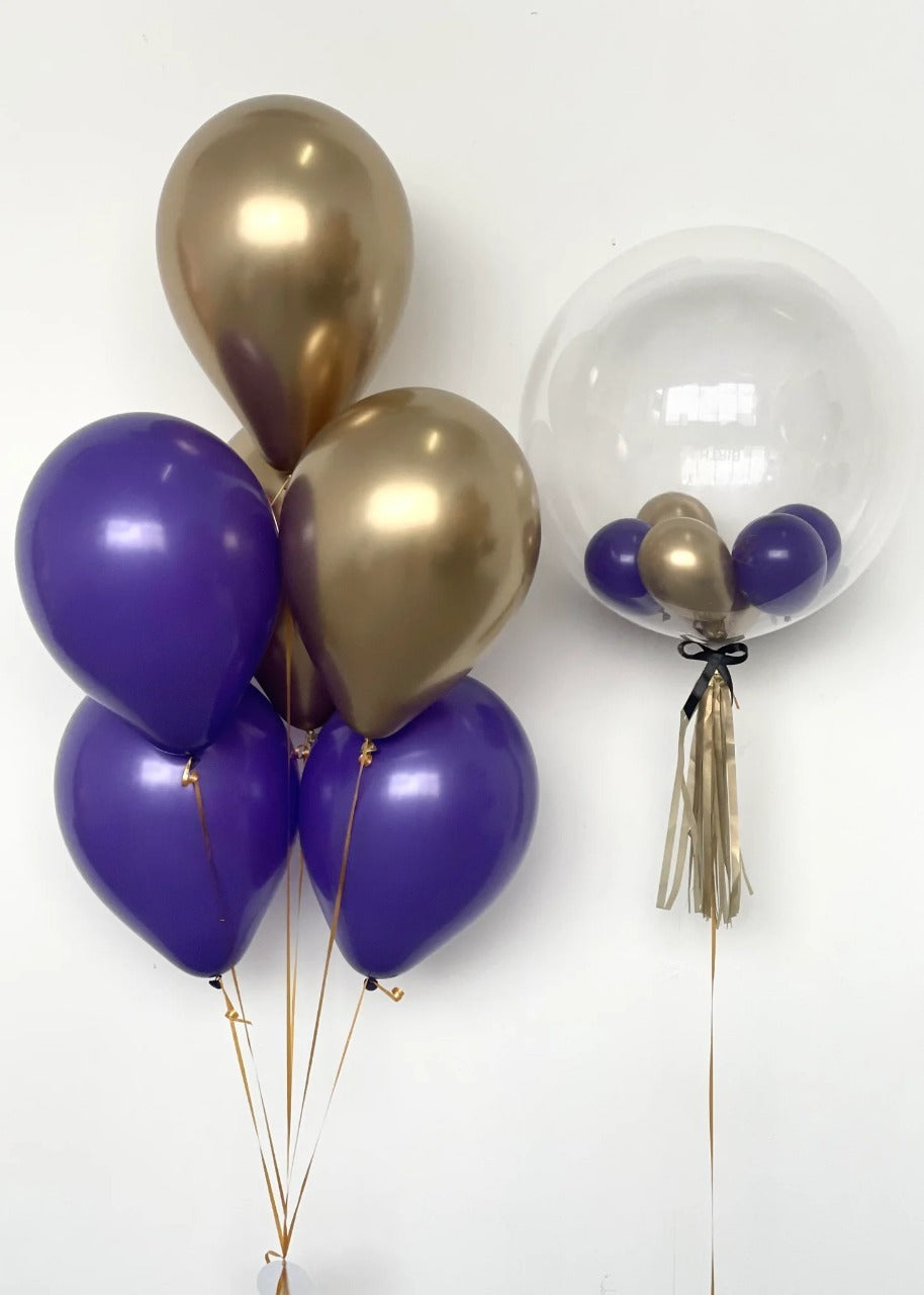 gold and purple balloons in Dubai