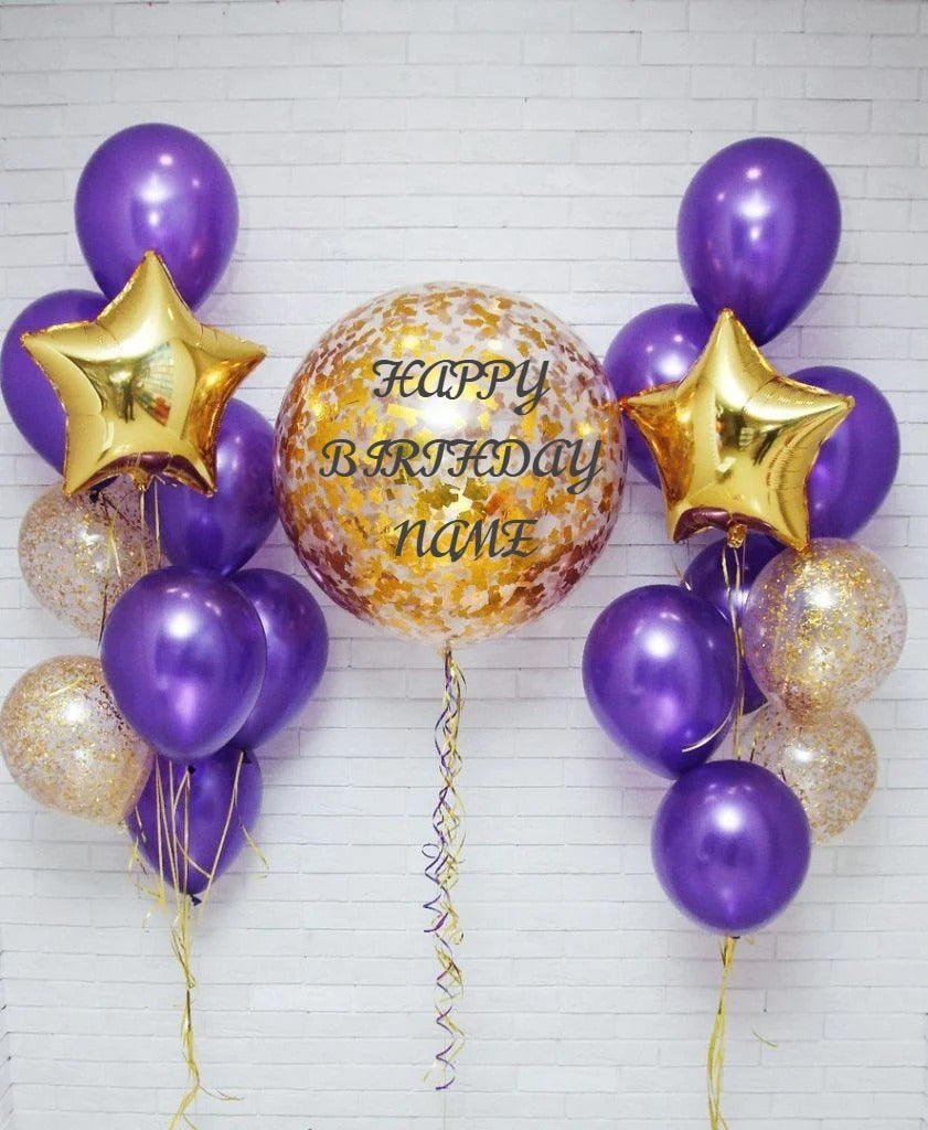 Decorative birthday balloon set with purple, gold, and clear balloons on a white background.