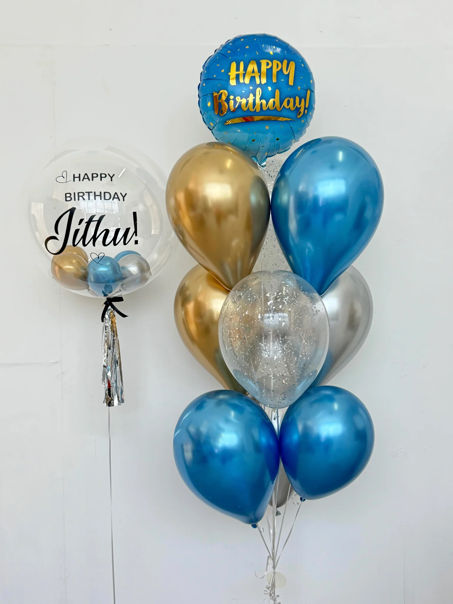 blue and golden birthday balloons in Dubai