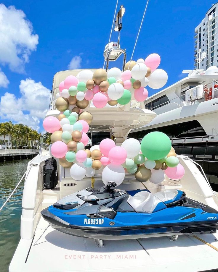 Yacht with a colorful balloon arch decor delivery in Dubai
